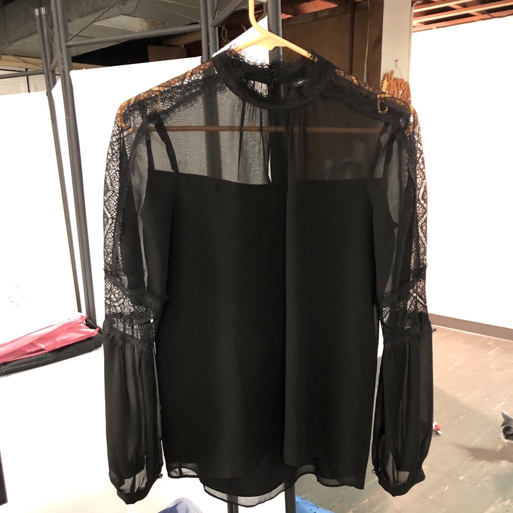 Long sleeve blouse. Never worn!